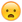 frowning