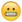 grimacing